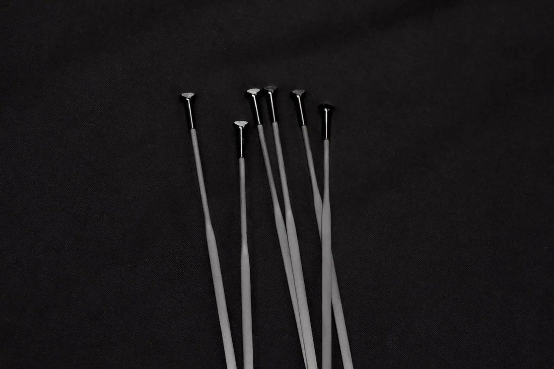 carbon vs steel spokes