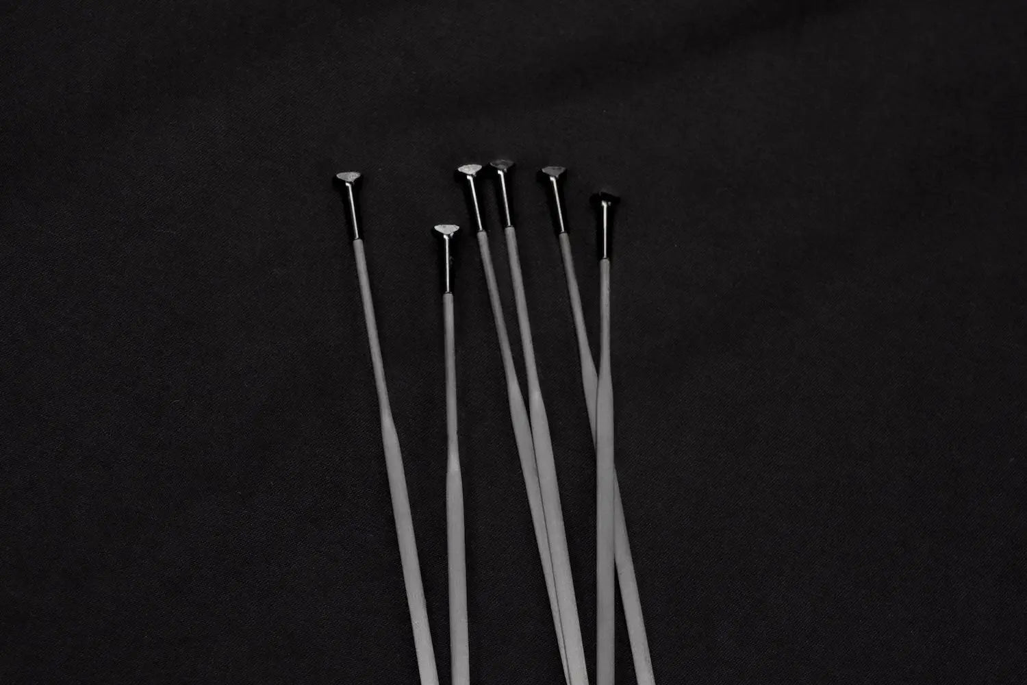 Carbon vs Steel Spokes: Which is best? - Particle