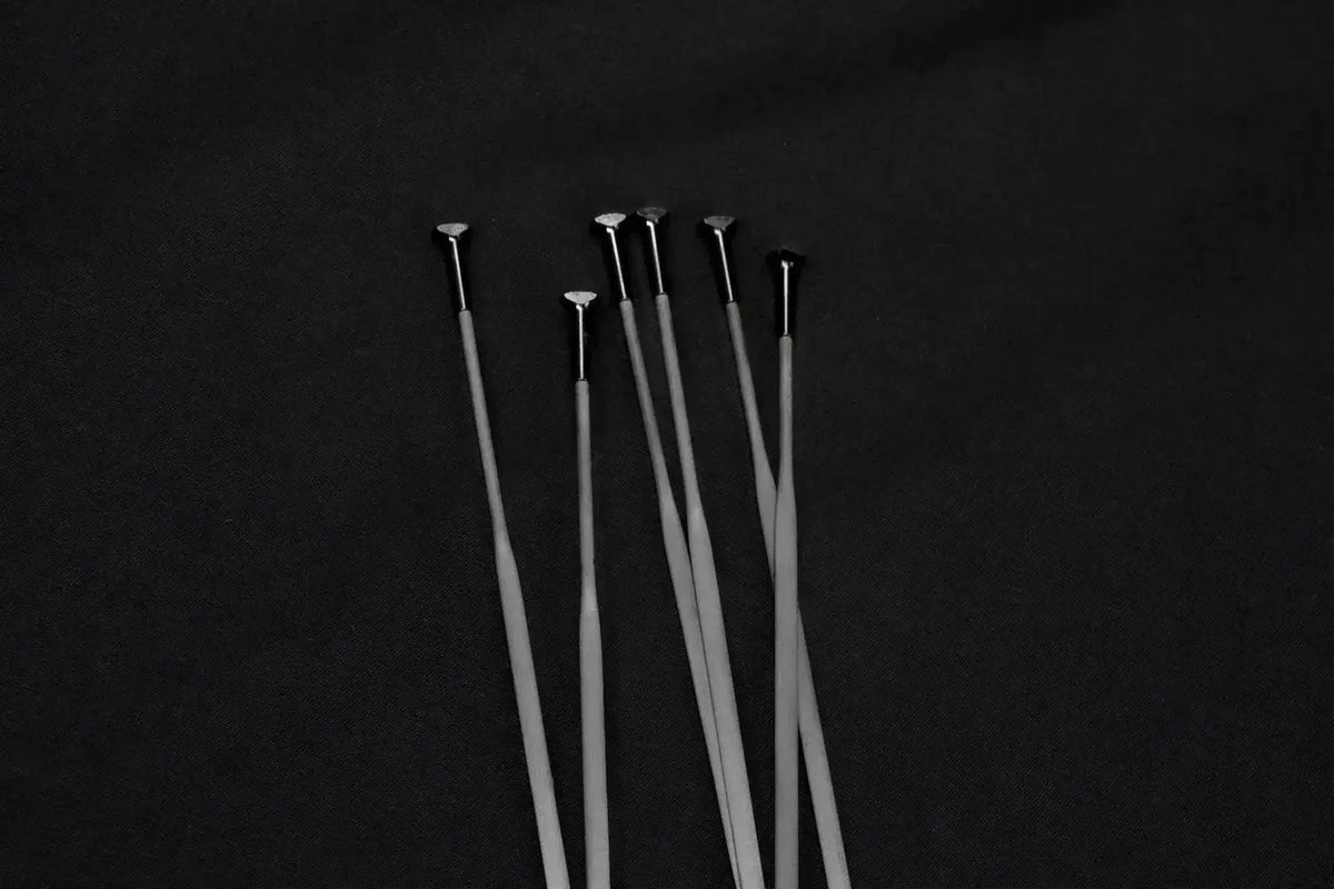 Carbon vs Steel Spokes: Which is best? - Particle